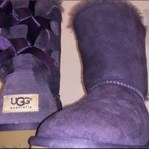 purple uggs with bows on the back.